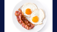 bacon and eggs on a plate