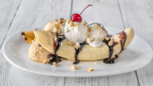Banana with ice cream and chocolate syrup
